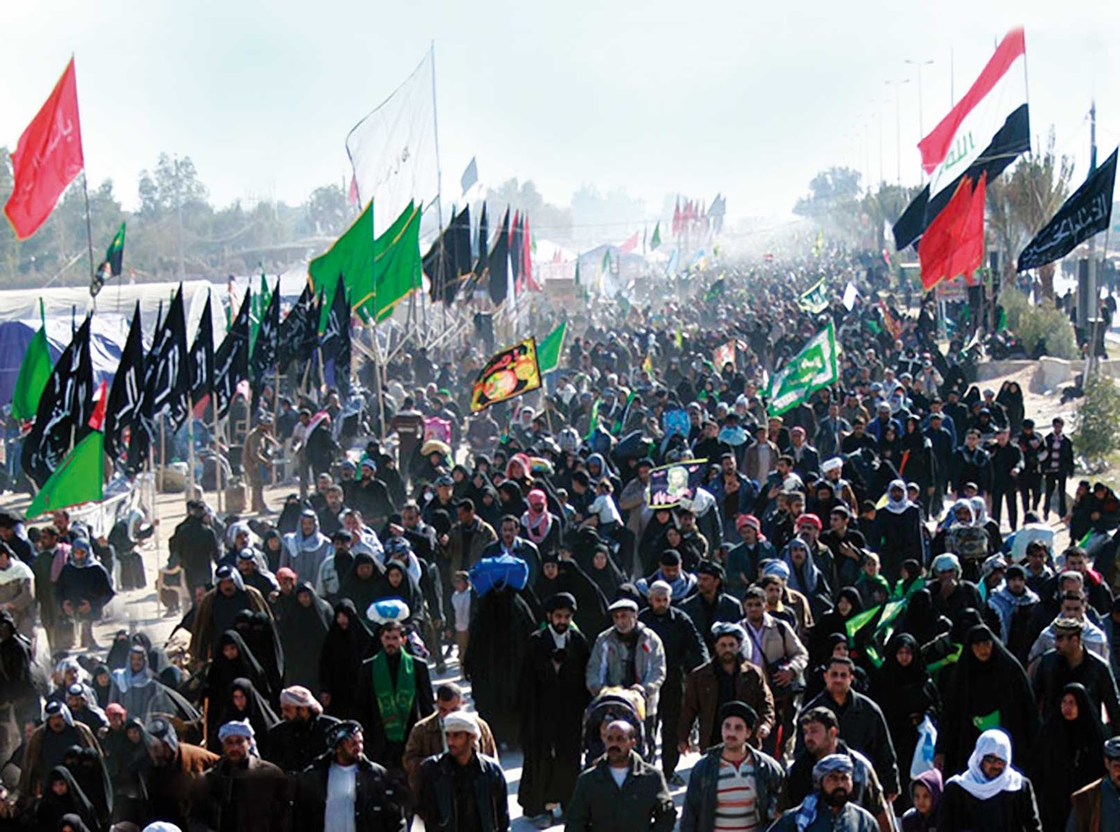 Pilgrims walking from Najaf to Karbala in one of the world’s largest peaceful gatherings