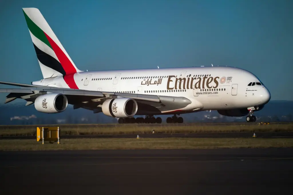 Emirates First Class suite with luxury features on a Dubai to USA flight