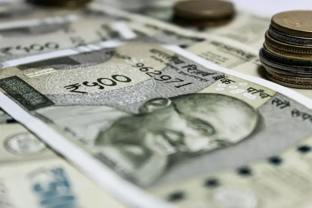 Trump tariffs India cause Indian rupee to drop against UAE dirham